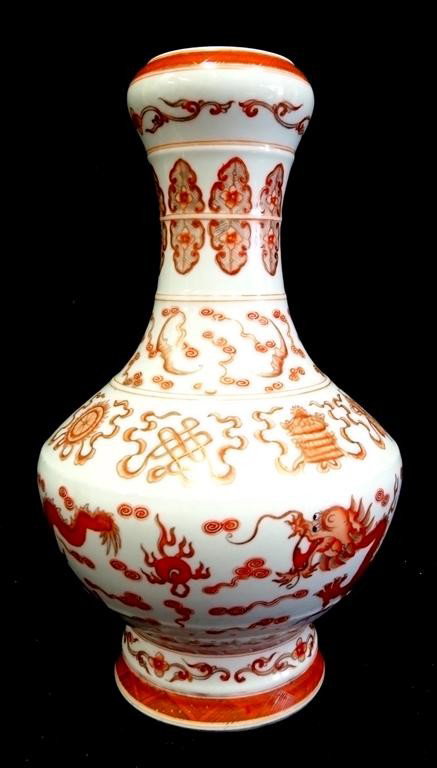 GUANG XU GARLIC TOP VASE: Heavily & finely potted. Painted with overglaze red & gilt buddhist emblems above striding five claw dragons after a flaming pear. Under glaze six character blue Guang Xu mark 15"H.