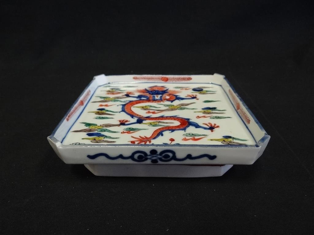 DOUCAI CHINESE PORCELAIN INKSTAND: Painted dragon decoration. Six character blue mark 1 1/2"H. 5 3/4" square