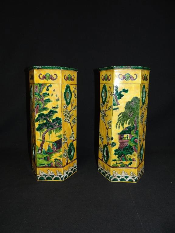 PAIR OF CHINESE YELLOW GROUND HAT STANDS: Decorated with bats in a landscape setting. 13"H.