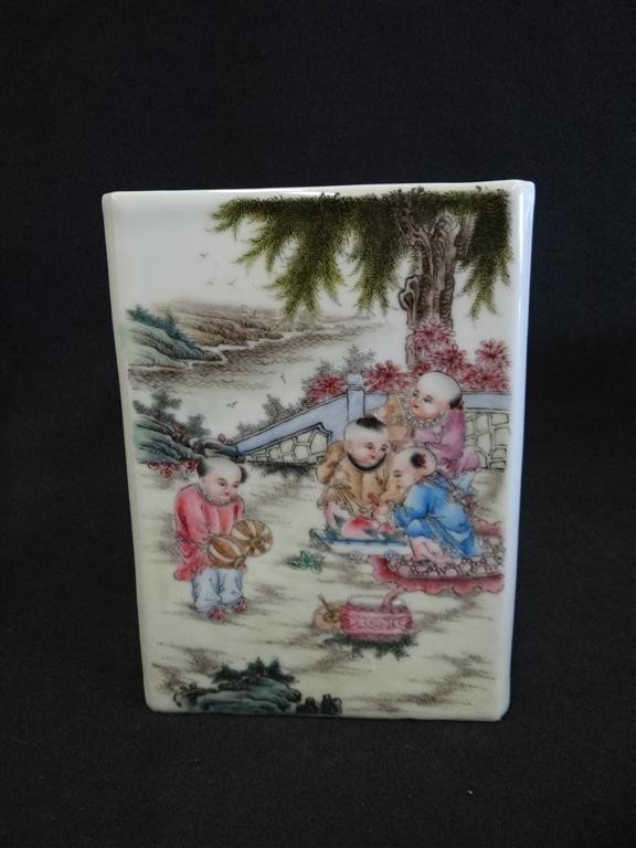 CHINESE PORCELAIN BRUSH POT: Hand painted porcelain square brush pot. Decorated with playing children and calligraphy, signed; 7in. H. x 5in.
