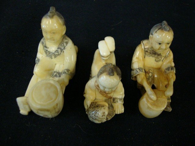 THREE CARVED IVORY NETSUKES: Figural forms
