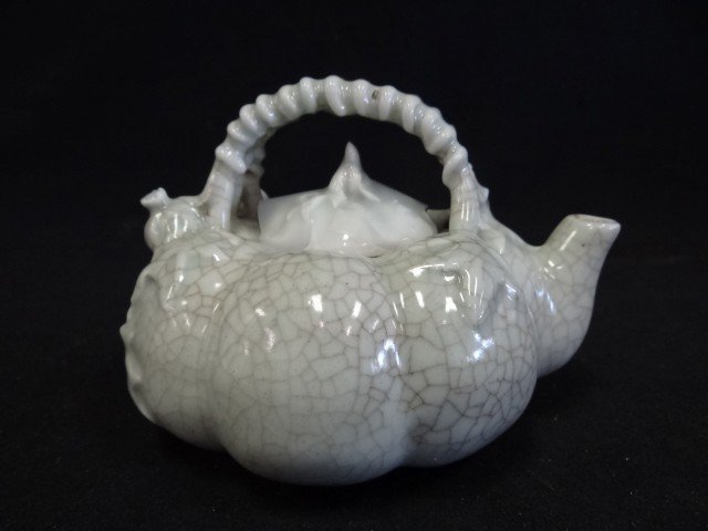 QING DYNASTY CHINESE TEAPOT: Pumpkin form. Crackle glaze teapot with raised decorations of pomegranates 4 1/4"H.