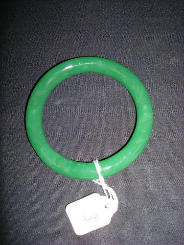 Chinese jade bangle bracelet: Green jade bangle bracelet; 3.25in. D. (2.5in. Opening)
