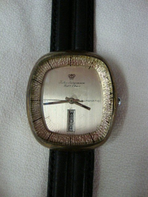 Jules Jurgensen Wrist Watch: Case is marked Sterling Silver and 925/1000 Automatic. Saddle leather band