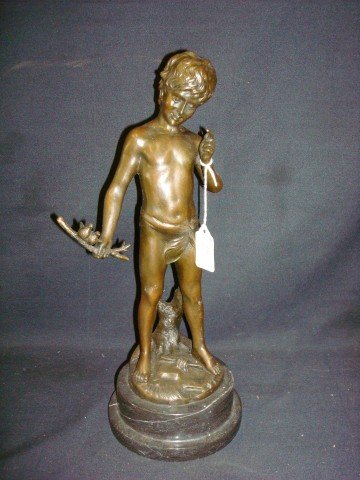 Bronze Figure of a Young Boy After Moreau: Well detailed young boy in a loin cloth on a forestlike round base with tree trunk. On a tiered marble base. Bears signature. A. Moreau. 14"H.