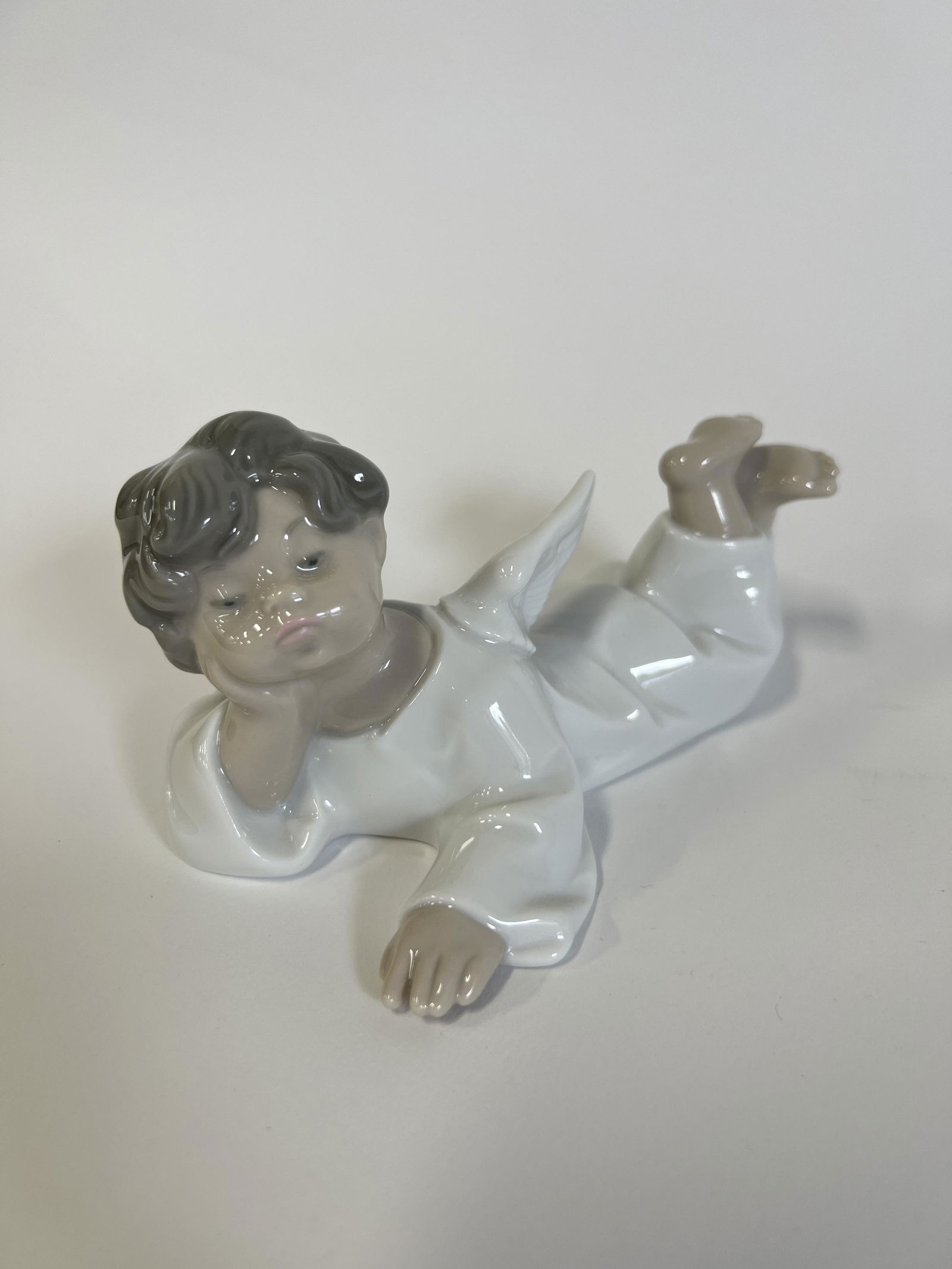 Lladro Figure Restful Angel. Signed (1 of 4)