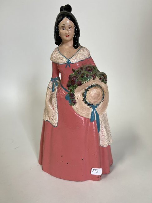 Antique Cast Iron Door Stop: Lady with a hat and flowers. 11 1/2"H