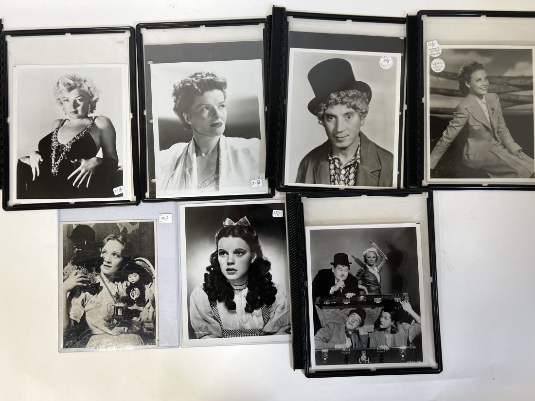 Collector or Dealer's Lot of Celebrity Photographs (8): All black and white. Most 8" x 10" Katharine Hepburn; Marilyn Monroe; Still with Spencer Tracy and others; vintage Marlene Dietrich (7" x 9"); Marx Bros.; Judy Garland as Dorothy; Abbot & Costello Cla