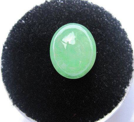 Natural Jadeite Cabochon 3.55 cts.: Type A. Not enhanced. Natural Jadeite stone. 3.55 Cts. 10.85 mm. x 9.04mm. X 4.33mm