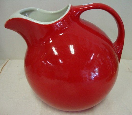 Hall Pottery Kitchen Pitcher Signed: Red Hall pottery kitchen pitcher. Marked Hall in a circle USA and numbered 633