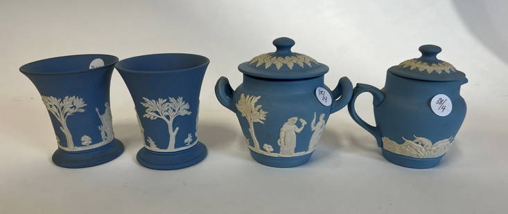 Collector or Dealer's Lot of Wedgwood & Jasperware (4): Comprised of a Jasperware covered sugar and creamer, Dudson Hanley and so marked both at the underside and two Wedgwood vases. Four items in the lot. 4 3/4"H and 5"H