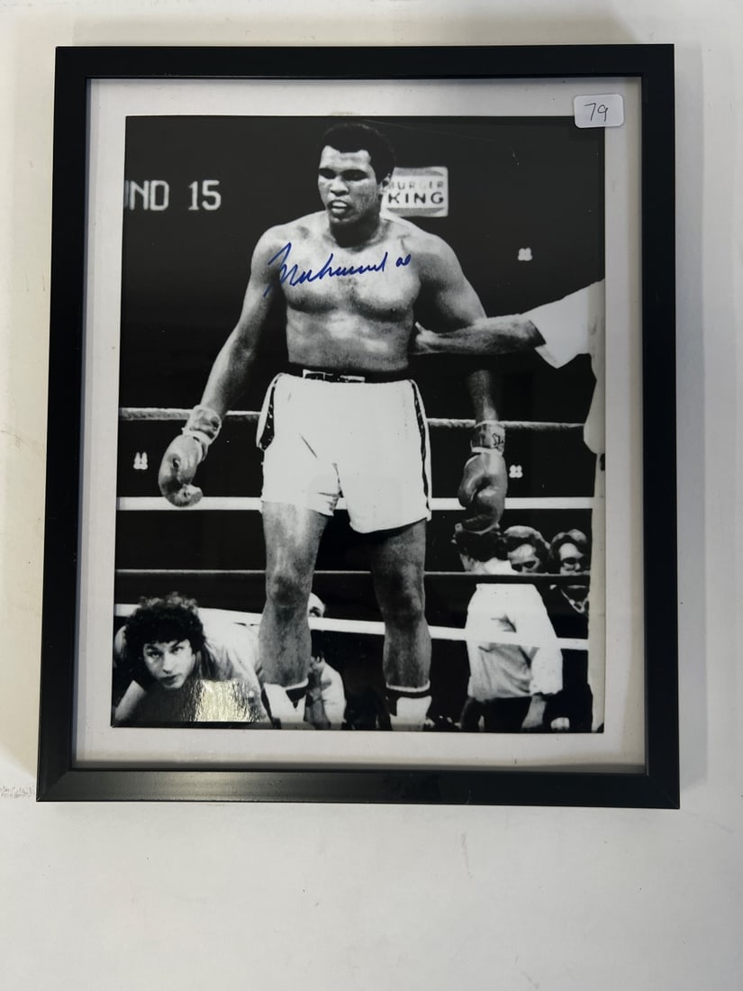 Muhammed Ali Signed Photograph: In the Boxing Ring. With Certificate of Authenticity 8 x 10
