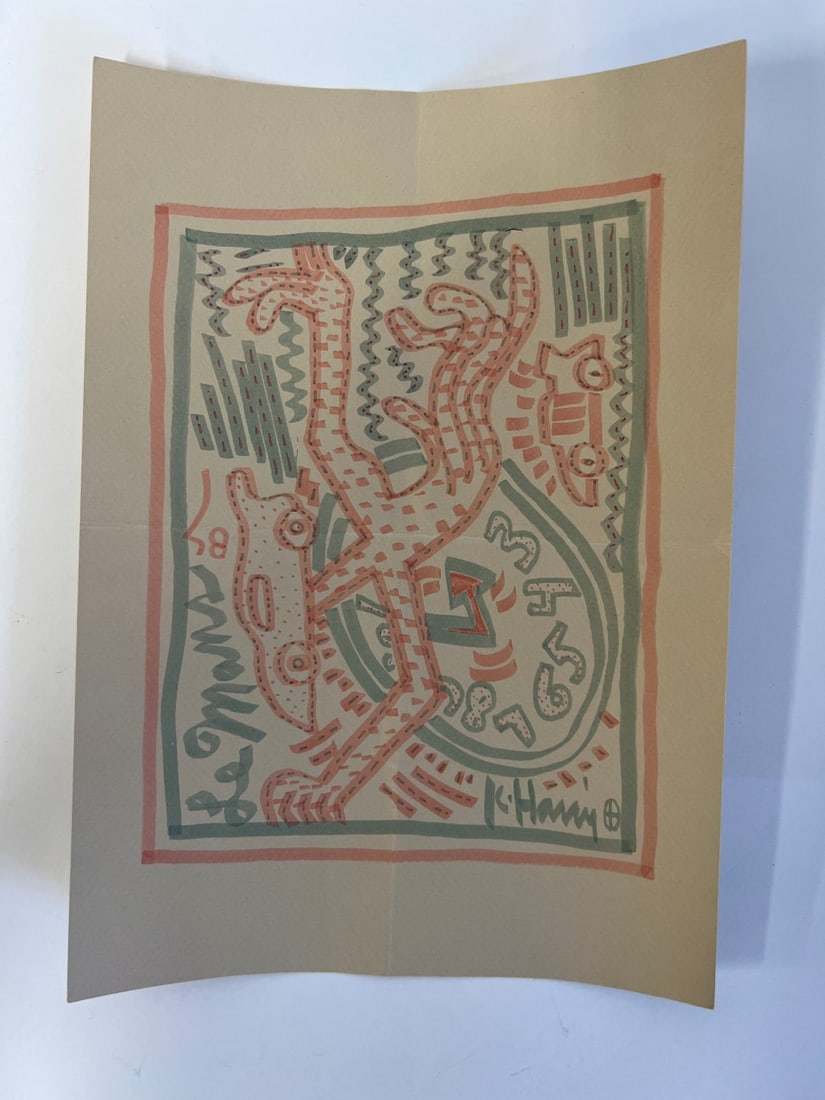 Keith Haring Lithograph: Signed K. Harint with symbol on the left. 8 1/4"H x 11 3/4"W