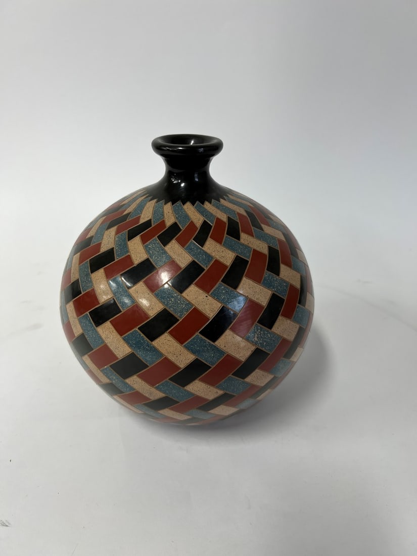 Good Quality Nicaraguan Pottery Vase Sgd.: Edward Maldonado. Best quality Nicaraguan Pottery Vase. Sgd. on the underside by the artist and dated 1996 Bulbous shape. 11"h and 8"W