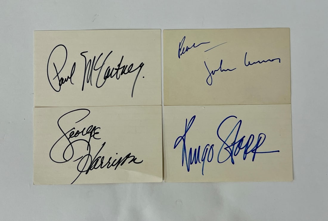 Beatles Autographs All four. Individual Cards: In black ink, boldly George Harrison; In blue ink, Peace, John Lennon; in bold blue ink Ringo Starr and in black ink, Paul McCartney All on 3" x 5" cards.