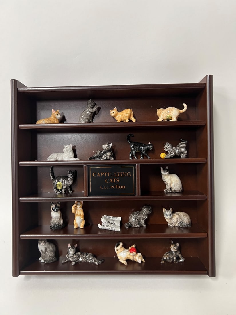 Captivating Cats Collection (18): 18 Miniature cat figures marked MBI housed in a five shelf cabinet. 11"H x 11 1/4"W