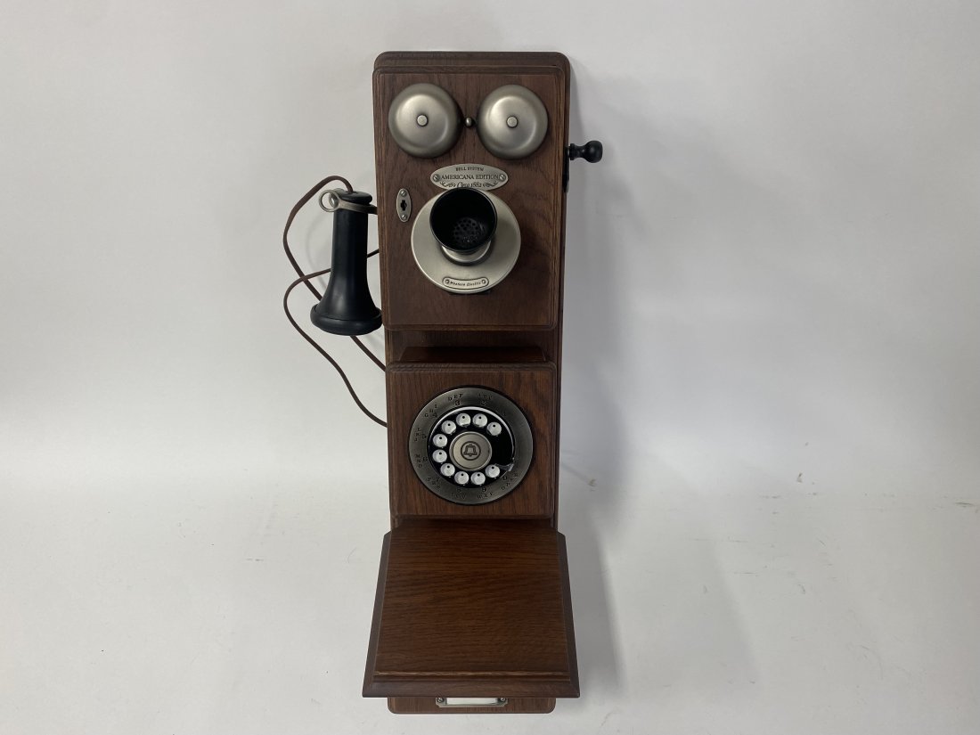 American Edition Wall Telephone C.1882: Made by Western Electric, an Americana Edition oak wall telephone, a reproduction of an 1882 original. With a customer instruction booklet. Working condition. Never removed from the box. Comprehensive
