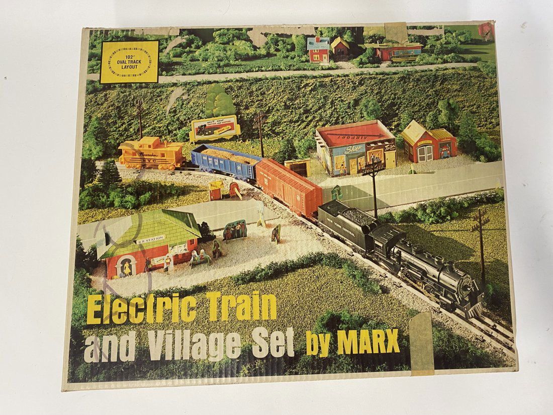 Marx Electric Train and Vintage Set: Steam Type Locomotive with Chug like noise. Remote control. 25 Watt. Listed Transformer. 102" Dval Track Layout. In the original box.