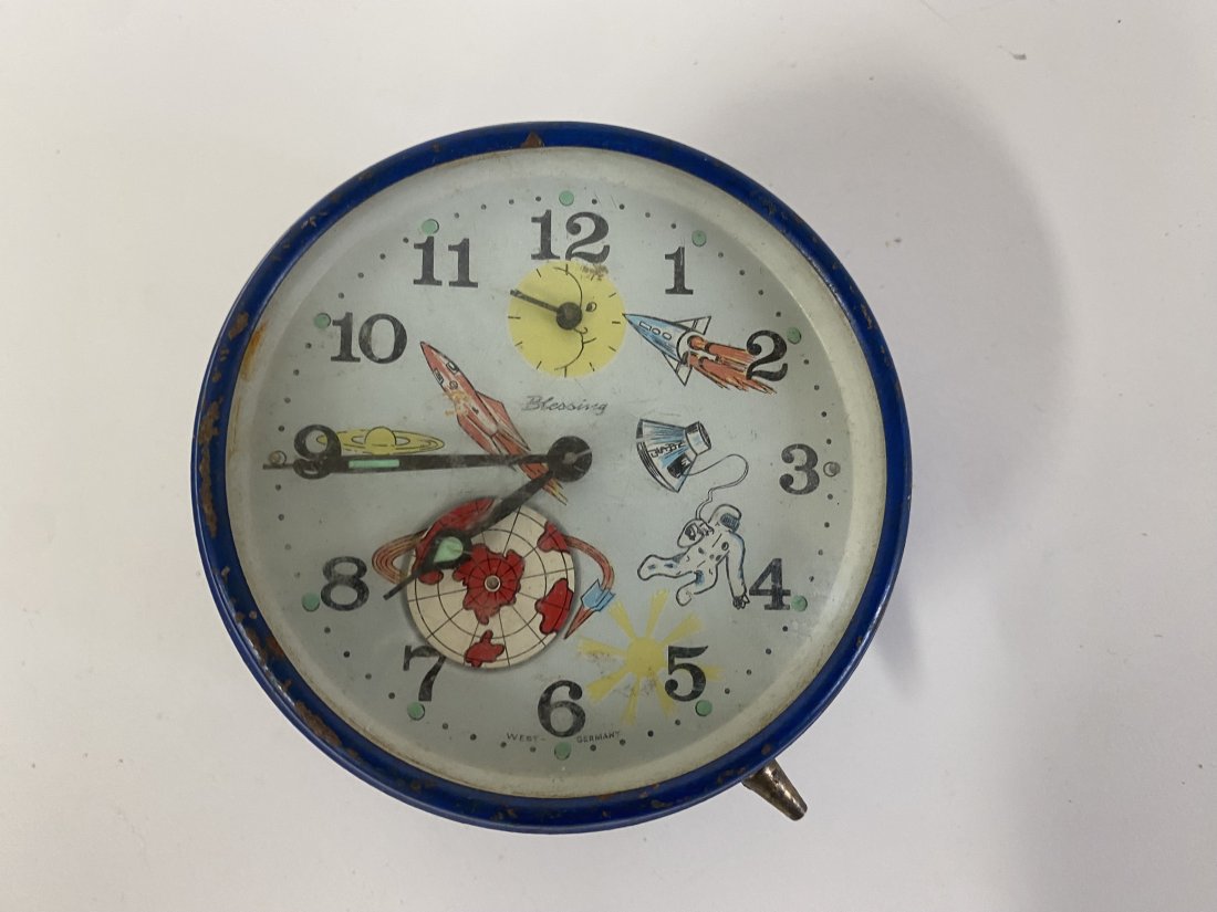 Antique Space Age Alarm Clock: Astronaut, space ship, rockets; globe; depicted on the dial. Made by Blessing, West Germany