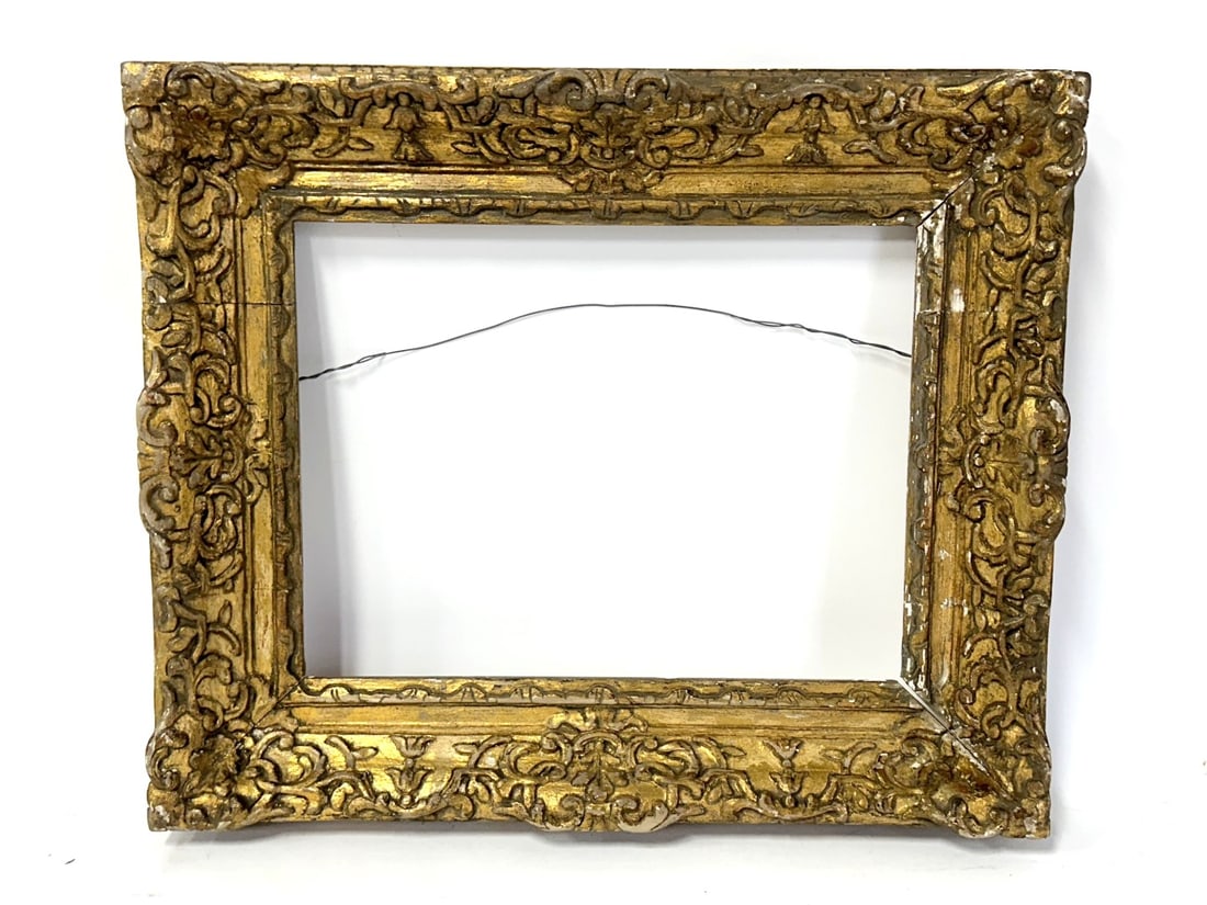Heavily Carved and Gilt Ornate Frame: Well carved and gilt ornate frame; 12in. X 16in.(rabbet-inner), 20in. X 23in.(outer)