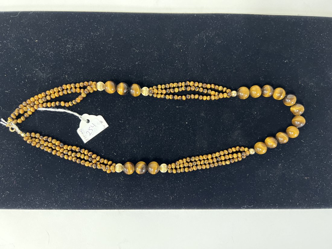 Antique Tiger Eye Necklace: Double strand in some parts. Good quality 23 3/4"L (entire) Marked on the clasp indisecrnibly