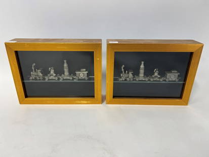 Pr. Framed Coca Cola Pewter mini trains.: Gallery mounted and framed in gilt frames. 6"H x 8"W x 2"D
