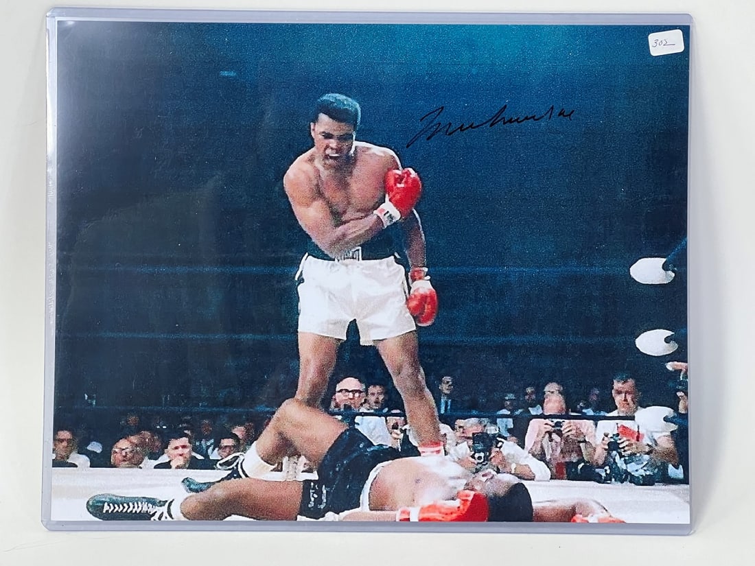 Muhammad Ali Signed Photograph: Heavyweight Champion 11 x 14 With certificate of authenticity