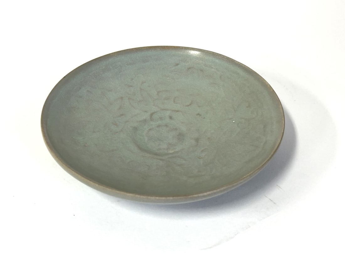 Scarce Song Dynasty Dish Molded & Engraved: 10th-11th Century fine condition. Images not doing it justice. A nice pale blue celadon glaze with floral decorations.1.25in.H. x 6.25in.D.