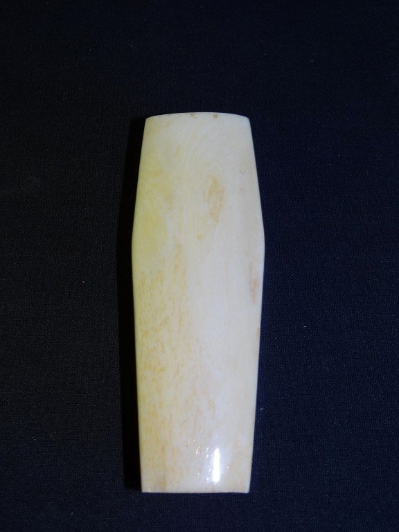 Carved Ivory Skeleton Figure in "Coffin": Completely articulated ivory skeleton figure in a shaped ivory coffin with slide out lid 4 3/4"L