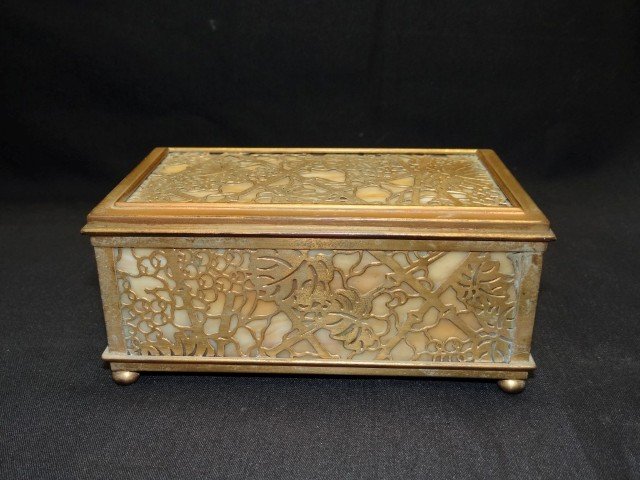 Tiffany Studios NY Bronze & Glass Box: Tiffany Studios NY bronze and slag glass box, grape and vine pattern. Initialed faintly M.E.A. at the top. Signed Tiffany Studios NY and numbered. With a fitted velvet interior for rings and other jew