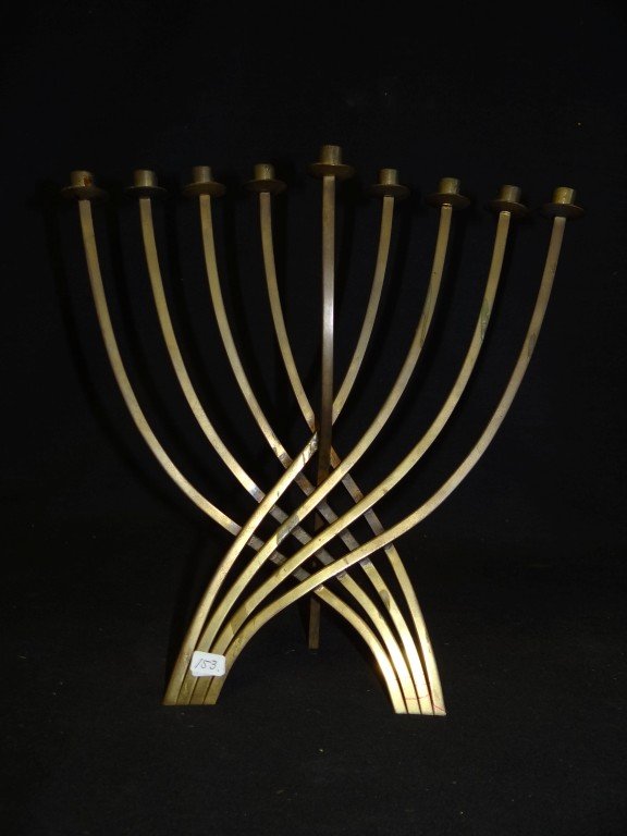 Zavel Zavel; 20th C. bronze Menorah: 20th C. bronze menorah designed by Zavel "Zavel Silber" Zavel; 10.5in. H. x 10.5in. W.