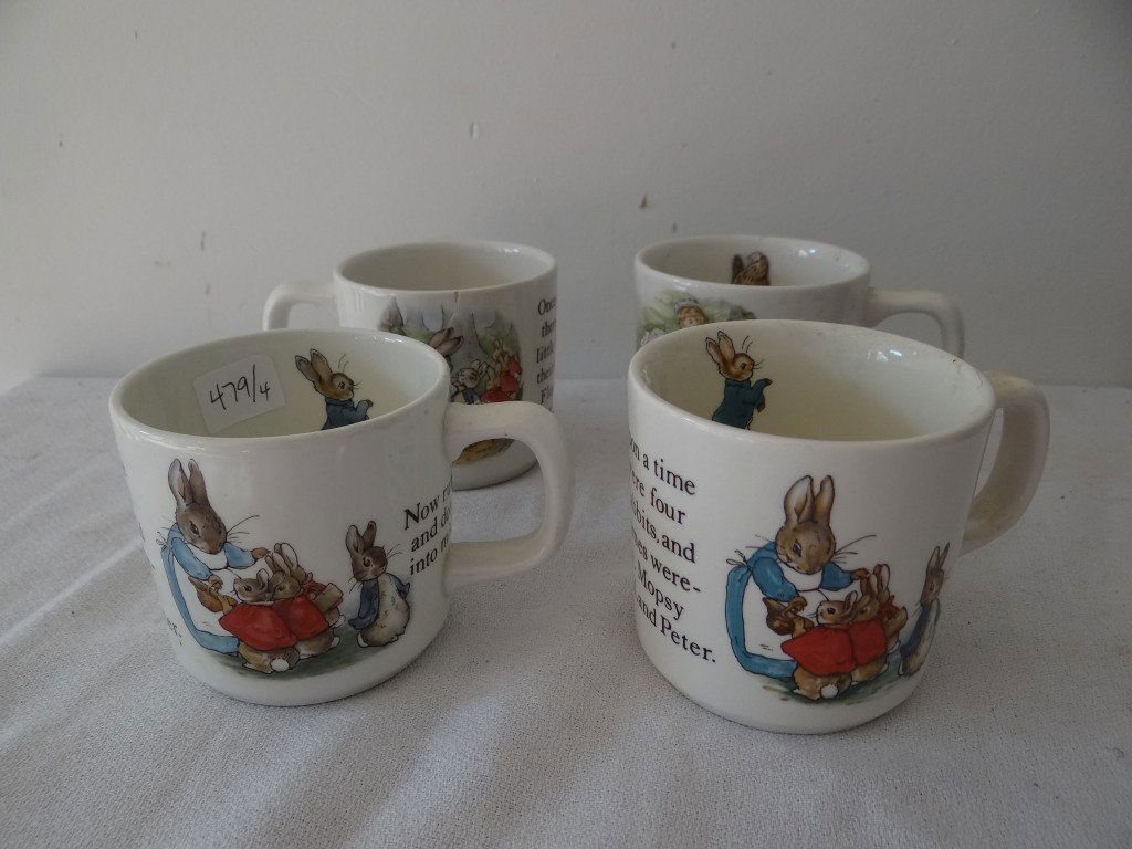 Four Wedgwood Beatrix Potter Mugs: Three mugs are Peter Rabbit and one is Mrs. Tiggy-Winkle