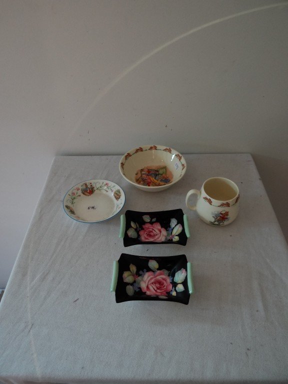 English China Lot Wedgwood, Paragon: Two hand painted Paragon dishes, decorated with roses and Royal Doulton Mug and Bowl, Bunnykins. Also in the lot is an unusually decorated Wedgwood Peter Rabbit bowl.