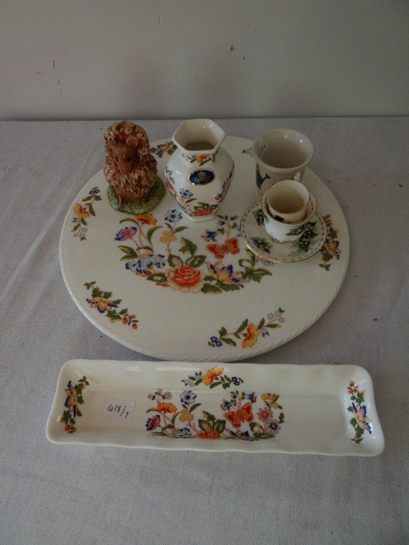 Lot of English China: Lot includes a Royal Albert doll's cup and saucer; an Aynsley tray , vase and plate (Cottage Garden pattern); a Wedgwood Bunnykins cup; a Goss "thimbleful" cup; a Beatrix Potter Beswick figure . Seven