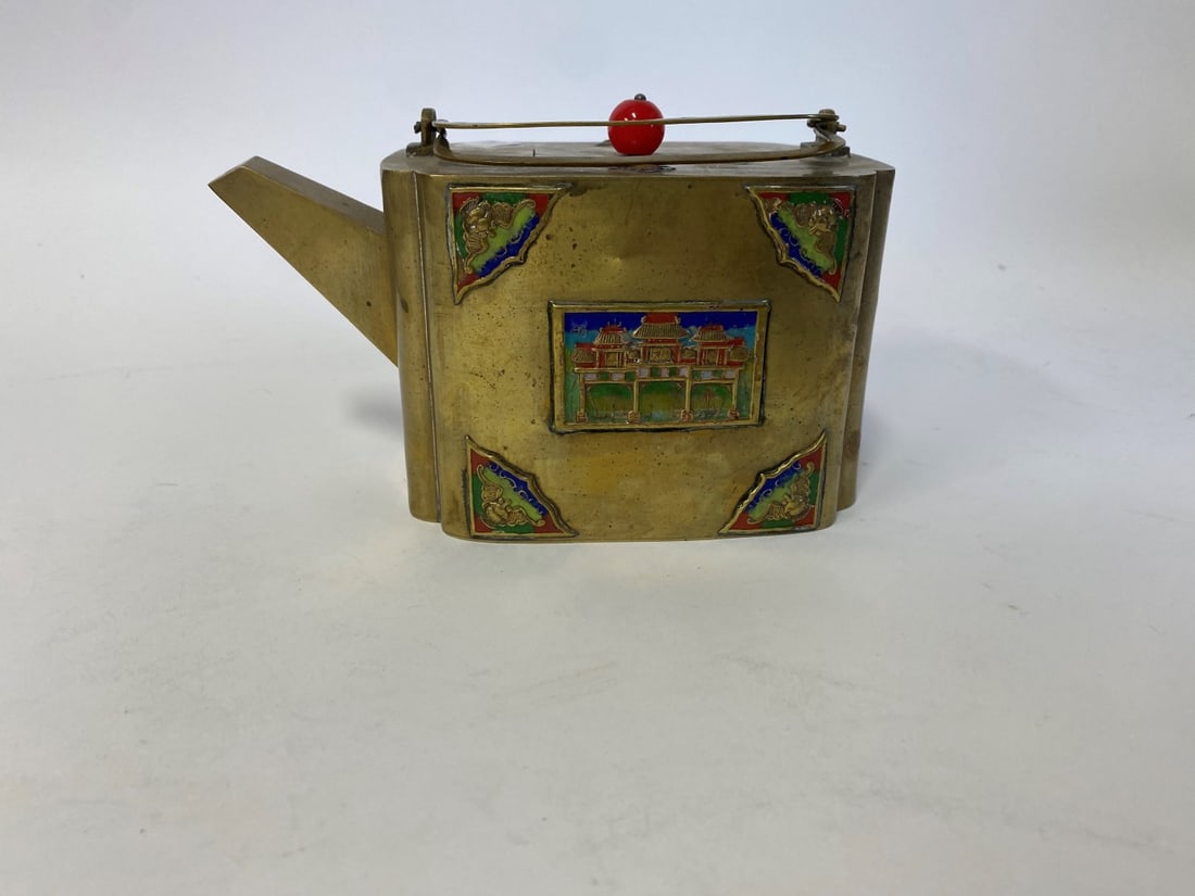 Antique Chinese Brass & Enameled Teapot: Double brass handles. Enameled panels front and back and at each end, multi colored and featuring dragons. Coral finial. 4"H (excluding handles when upP and 7 1/2"W