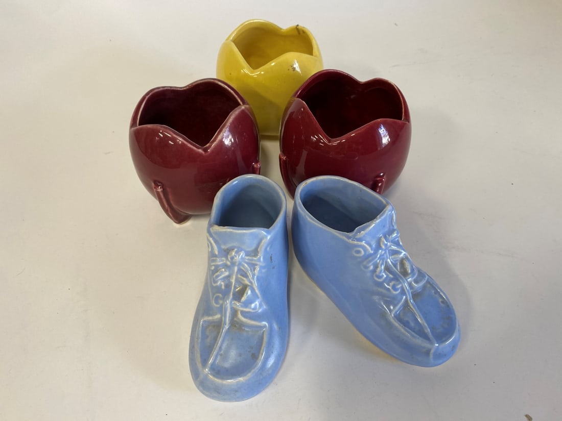 Collector;s Lot of McCoy Pottery (5): Nelson McCoy , all with NM mark for Nelson McCoy , one yellow vase and a pr. of maroon. vases together with two blue booties 5 pcs. in the lot., one yellow vaseand a pr. of maroon vases as well as a p
