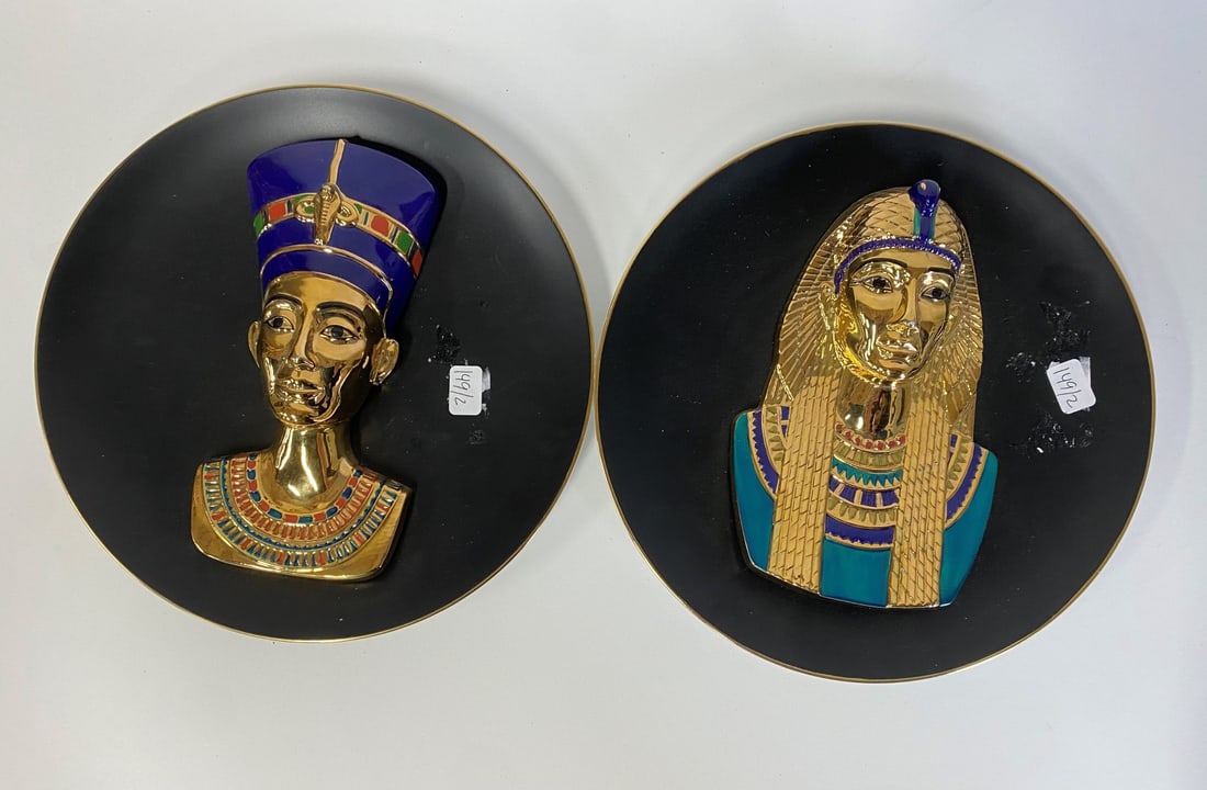 Pr. Egyptian Portrait Plates Cobalt & 22K Trim: One inspired by Nefertiti-The Eternal Beauty and one inspired by Cleopatra , The Empress and Enchantress. Both with bas relief portraits and with with 22K gold accent. Two in the lot. 8"W