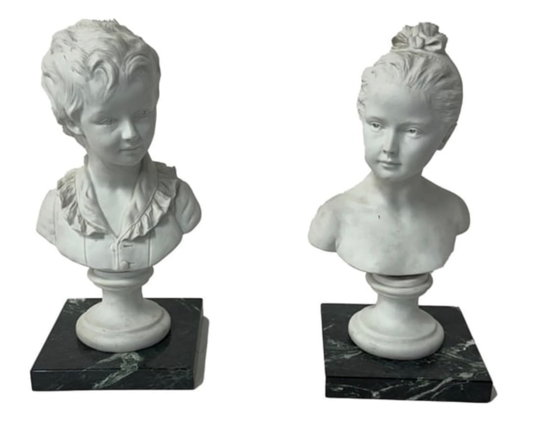 Jean Antoine Houdon . (After) Pr. Bisque Busts: After Jean Antoine Houdon, (1741-1828) Young girl and boy. Each inscribed A. Brongniart enfant Apres Houdon . Marble bases. 17.5"H x 8"W