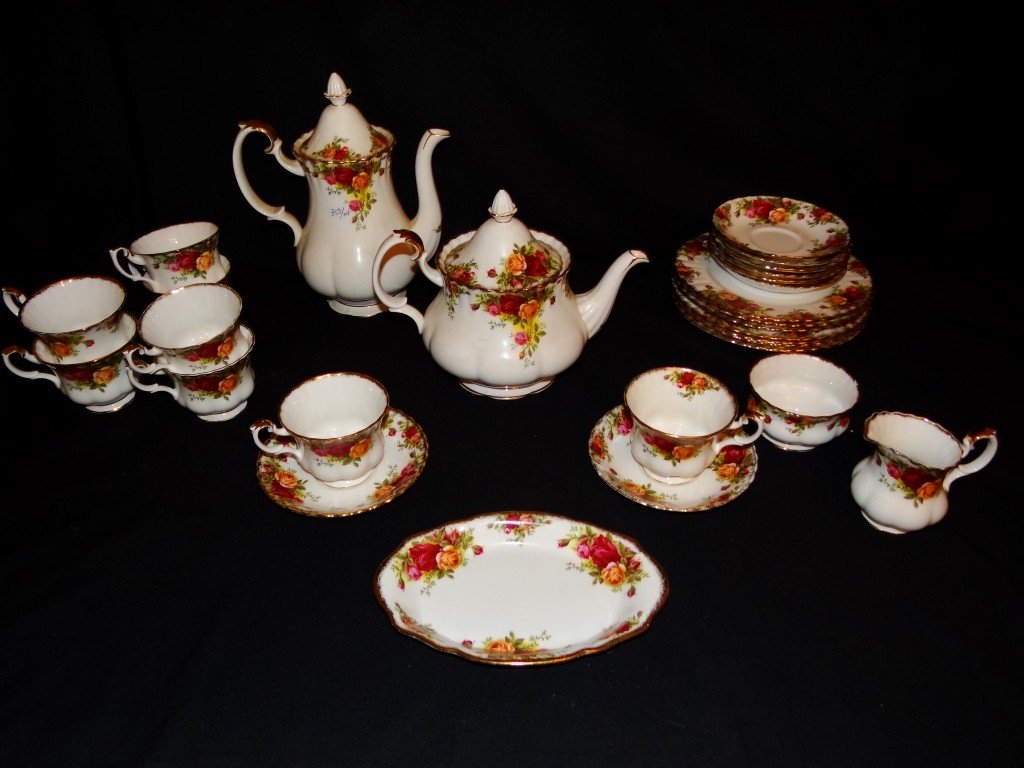 Royal Albert Old Country Roses Dessert Service (29: In the Old Country Roses pattern. Marked Royal Albert Bone China England. The set is comprised of seven 8" plates; eight cups; eight saucers; a coffee pot; a teapot. a sugar a creamer and two service 