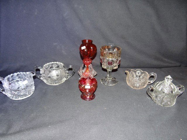 Cranberry Glass Victorian Vase: Blown 19thC. Victorian cranberry glass vase with applied clear glass base. Some base chips Included in the lot is a carnival glass toothpick holder by Imperial Glass signed and seven other pcs. of ant