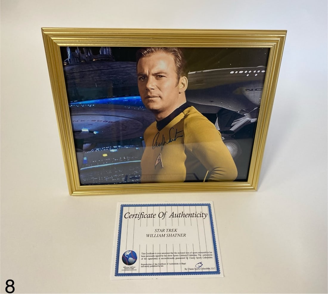 William Shatner as James Kirk Photo Sgd.: Signed ion ink. In gold frame. 8 x 10