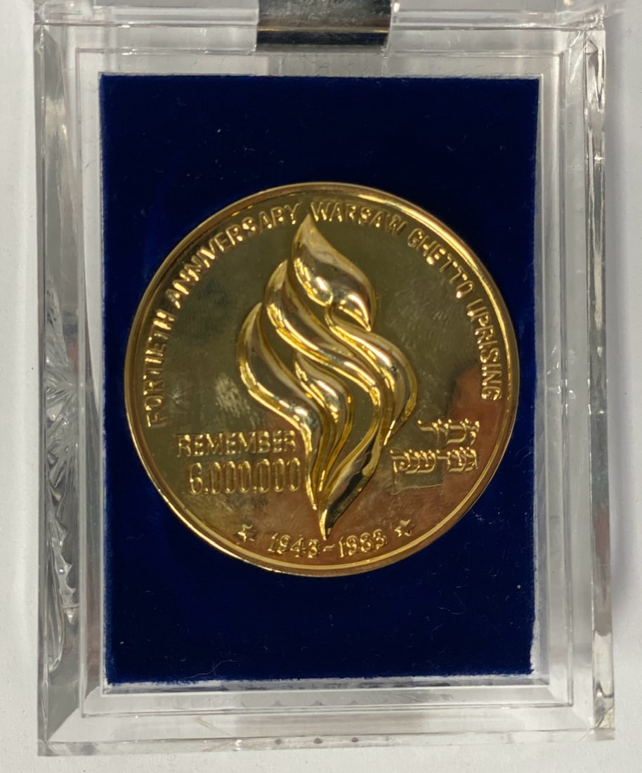 Bronze Medal. Warsaw Ghetto Uprising: 40th Anniversary Medal. 1943-1983 to commemorate American Gathering of Jewish Hoolocaust Survivors. Dore Bronze. 2"D In original plexiglass presentation box.