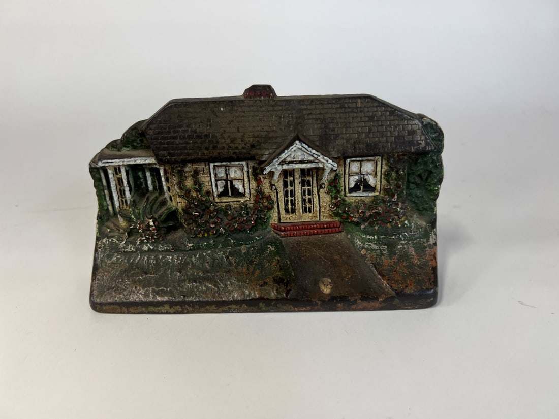 Cast Iron Door Stop Cottage: cjo 1283 4 1/2"H x 8 1/8" W Pictured on Pg. 240 Smith The Door Stop Book