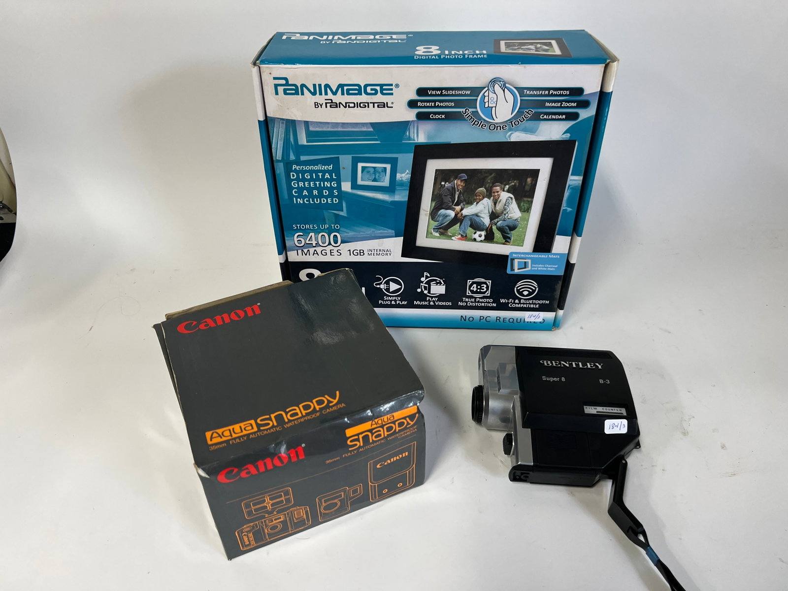 Panimage by Pandigital Canon Snappy AS-6 Bentley B3 (3): Three items in the lot. As pictured. Original boxes One item, Bentley Super 8 B3 (without box) Three items in the lot,