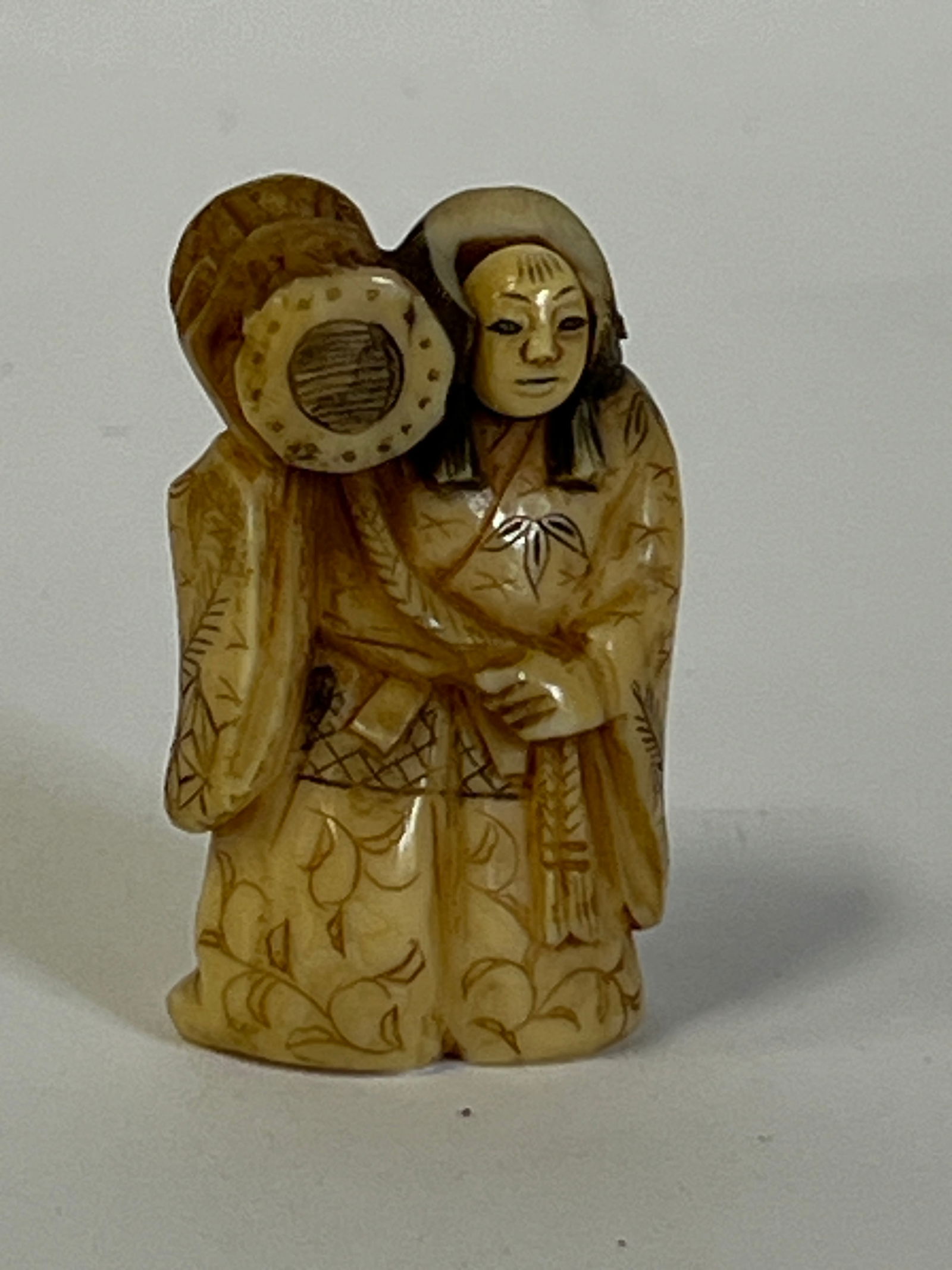 Antique Japanese Scrimshaw Carving. Mechanical: With calligraphy marks at the underside Head spins to create a second look. As pictured