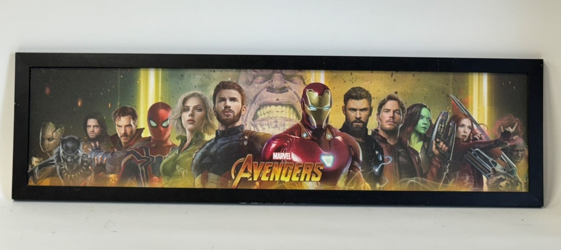 Framed Avengers Print: Featuring Iron Man and the rest of the Avengers with Thanos in the background. 10.25"H x 36"W
