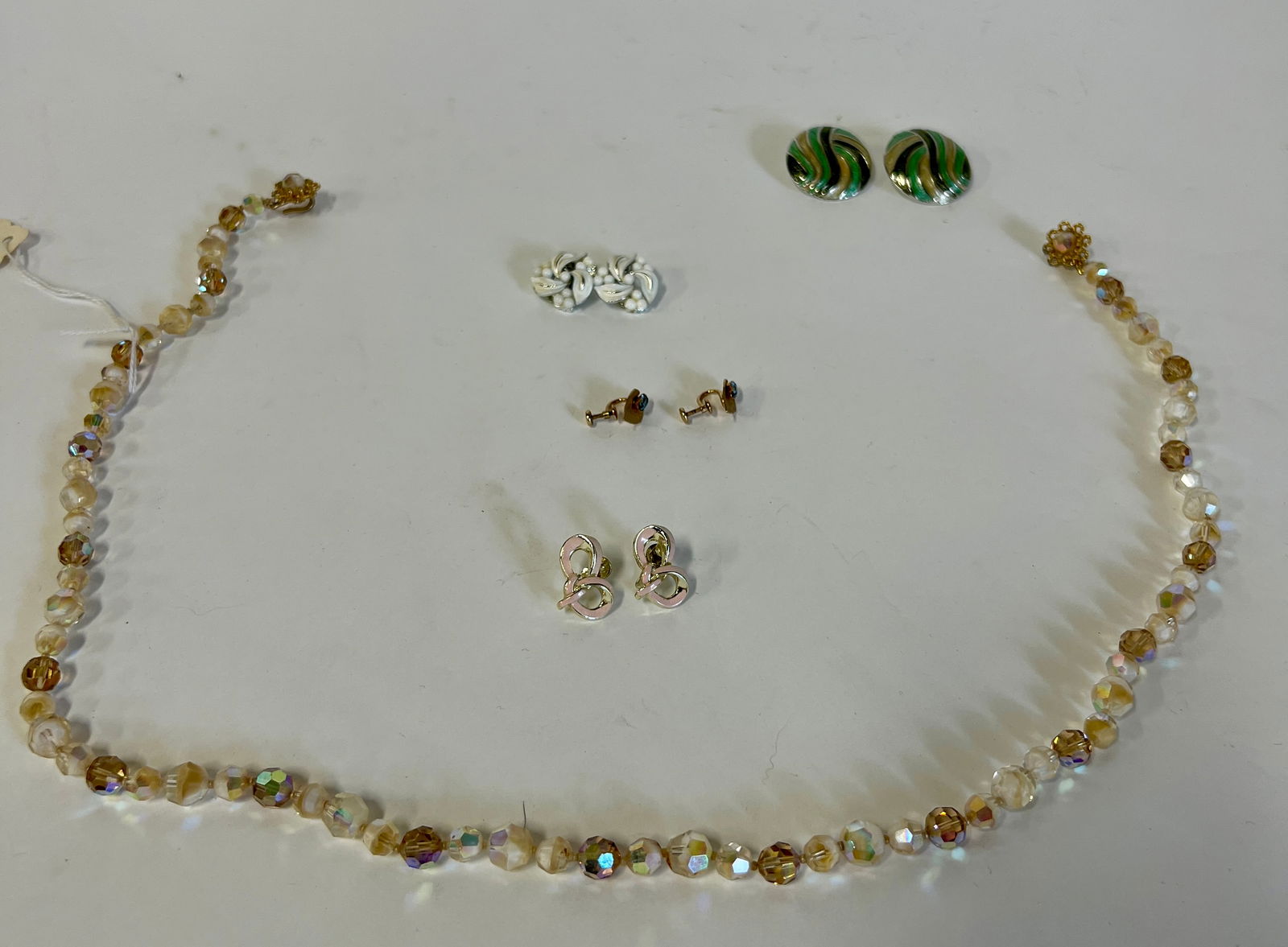 Sgd. Jewelry inc. Van Dell. McCann Etc. (5): Pr. Van Dell 1/20 K GF earrings with blue stone (screw backs); Lisner enameled white clip earrings, sgd.;Coro pink enameled earrings , sgd (clip backs); Judith McCann sgd, 1950's crystal necklace and