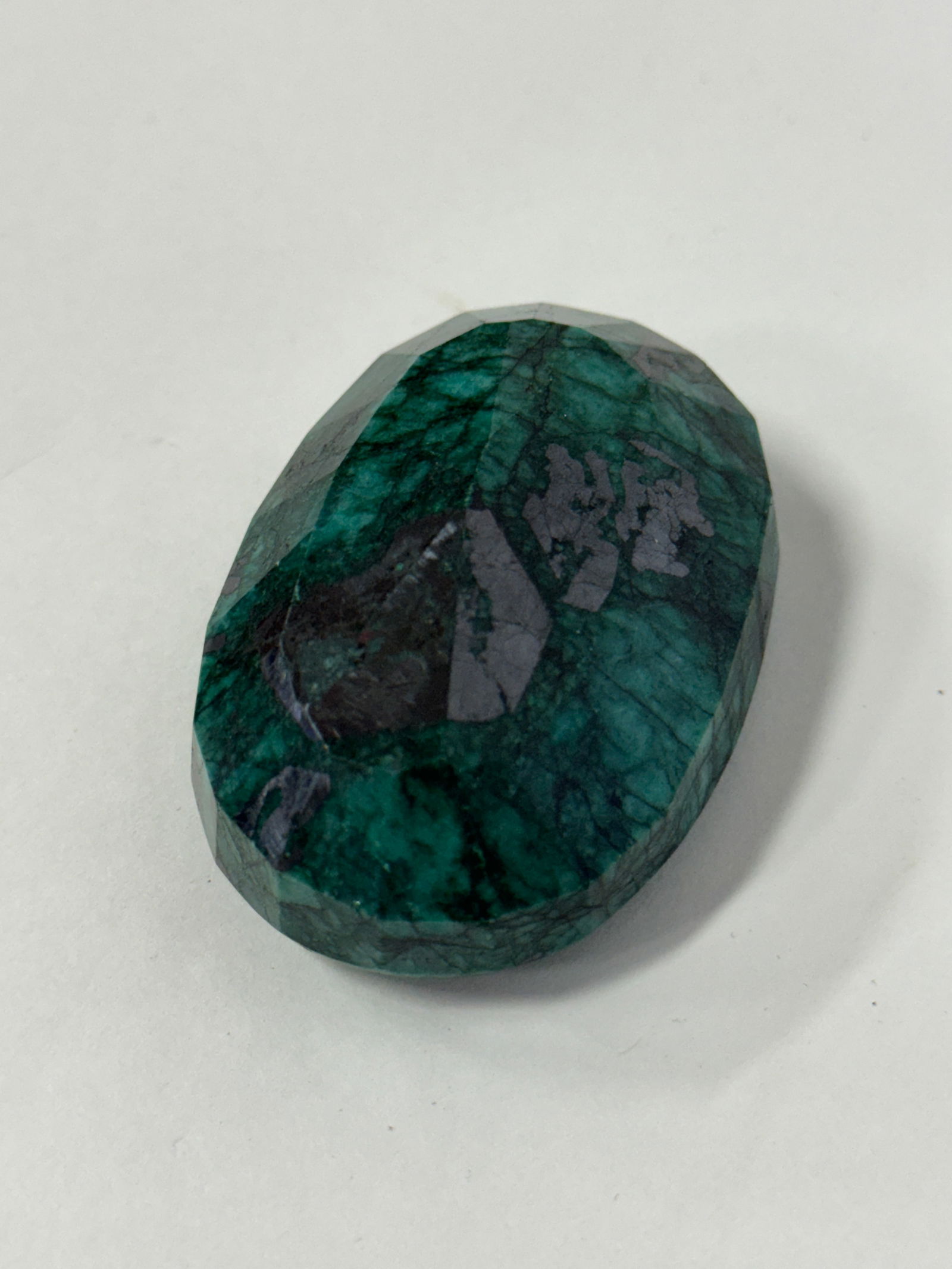 Natural Emerald 484 Carats With Certification: Oval cut.61 mm x 41 mm x 20 mm. Comes with certification card.