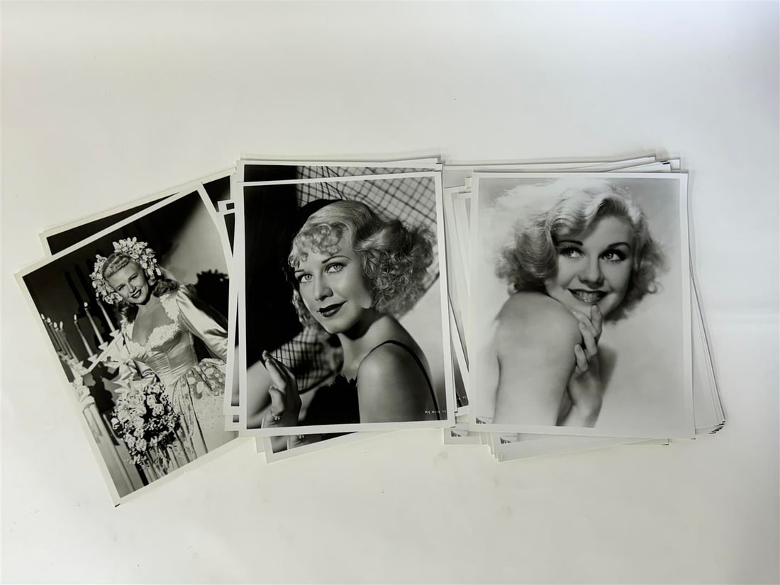 Ginger Rogers Photographs (23): Three different images. Two in wedding attire. Six in the hat and Ffteen Glamour girl portrait. All 8 x 10" All black and white. Twenty-three in the lot