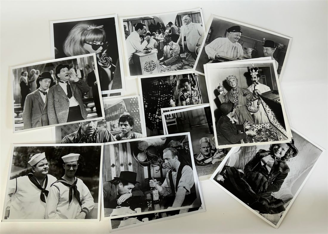 Hollywood Photographs (16): Humphrey Bogart (2) inc. scene from Casablanca; Montgomery Clift; Laurel and Hardy (6). (four dfferent images); Shrley Temple; James Stewart in undentified movie (2); and The Marx Bros (2), same image